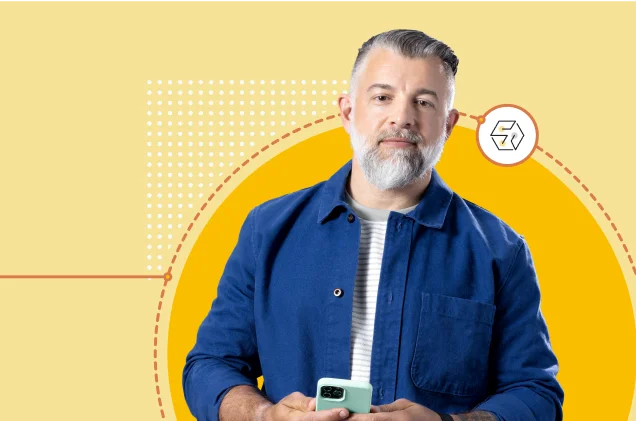 Elinde bir cep telefonu tutan ve düşünceli gözlerle bakan bir adam